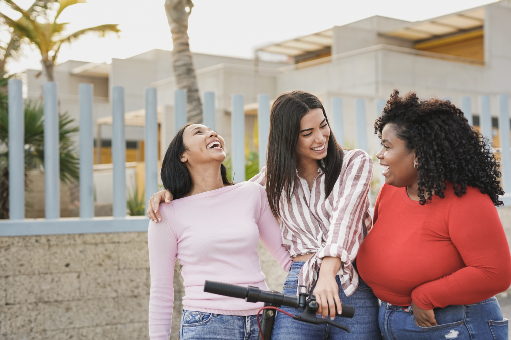 Three women laughing